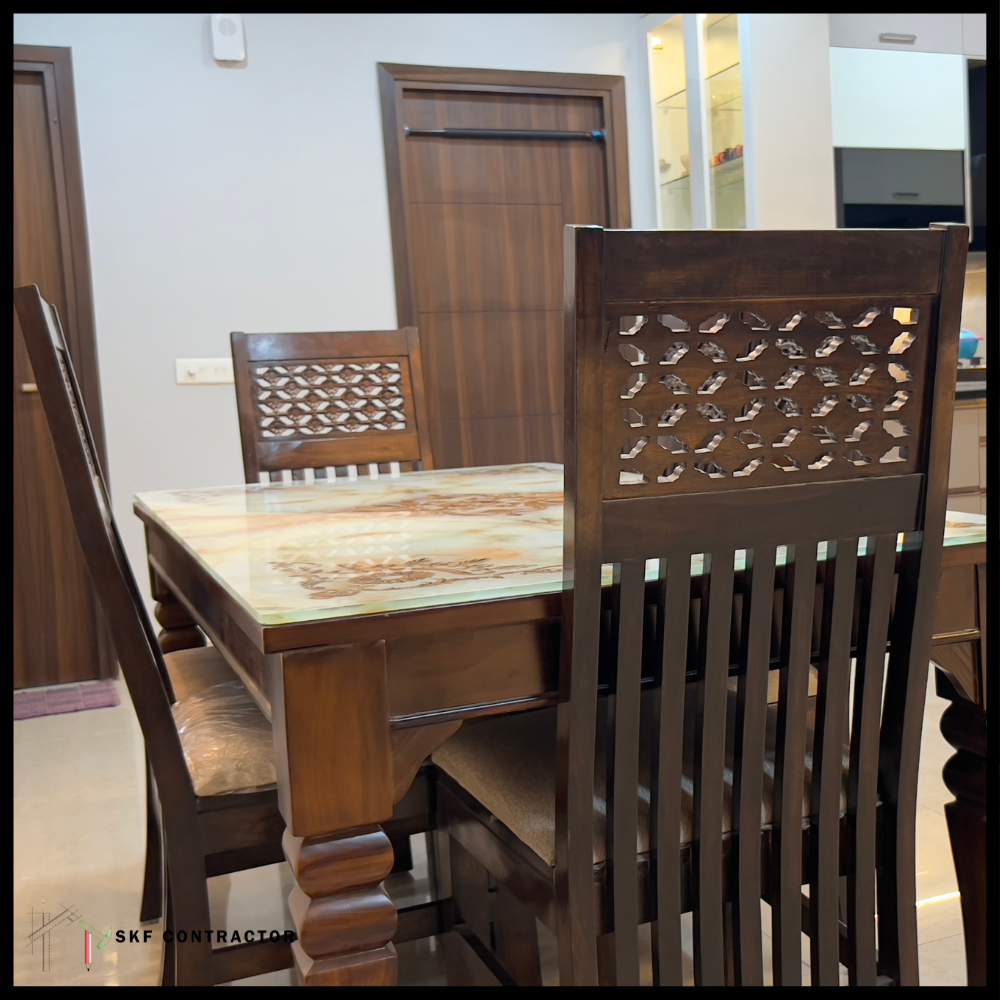 Dark wood 6-seater dining set with marble inlay glass table and geometric lattice carved chairs.